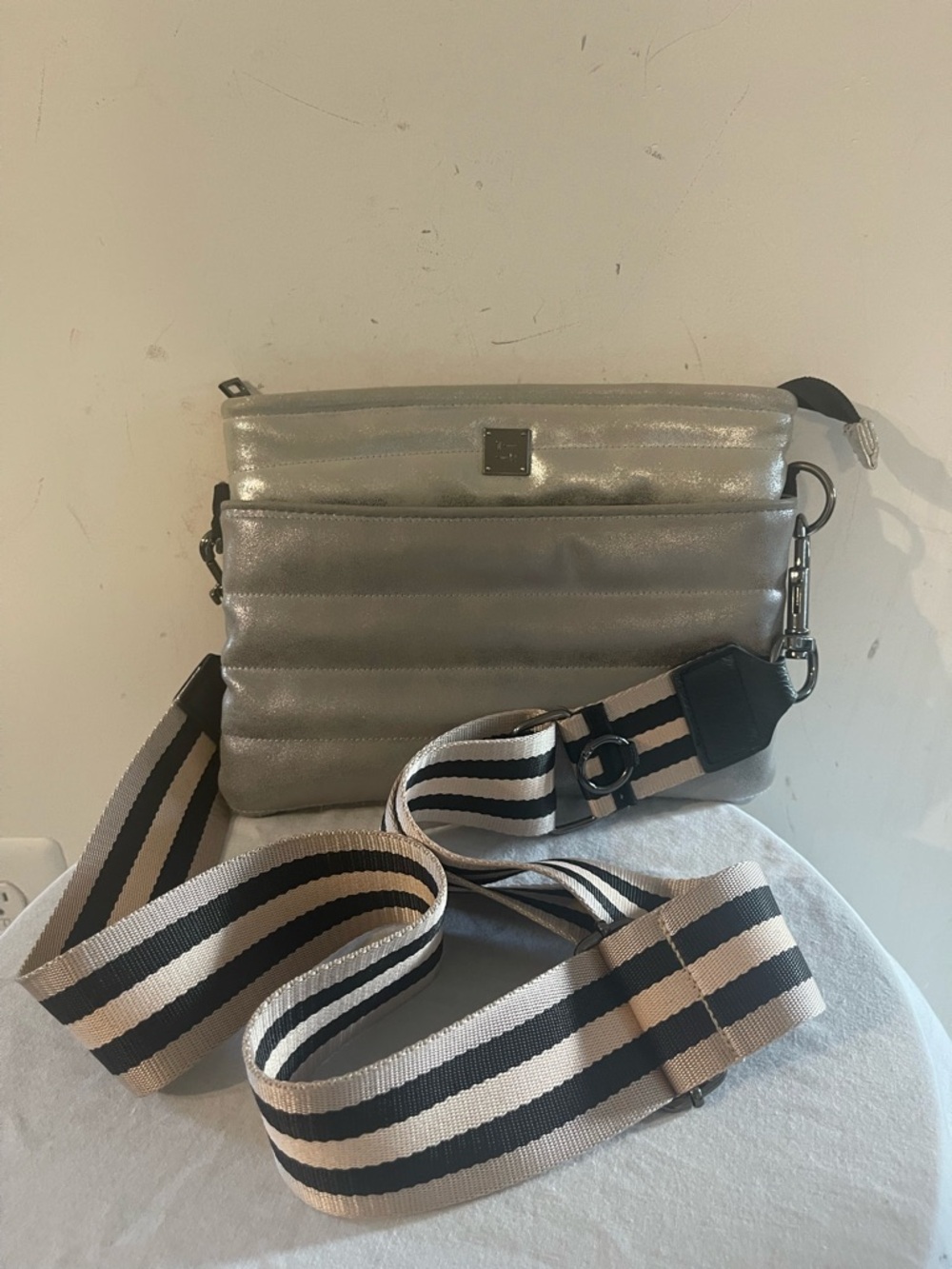 Think Royln Metallic Silver/Gold Quilted Crossbody Bag with Striped Strap